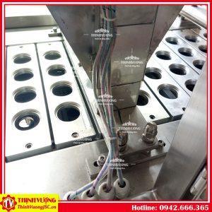 Máy chiết bột, dán màng seal nhiệt tự động (4 hộp) – Hình ảnh máy tự động | ThinhVuongJSC.VN may chiet bot dan mang seal tu dong 4 hop 2