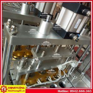 Máy chiết bột, dán màng seal nhiệt tự động (4 hộp) – Hình ảnh máy tự động | ThinhVuongJSC.VN may chiet bot dan mang seal tu dong 4 hop 8