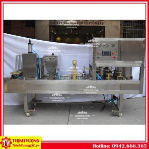 Máy chiết rót dạng lỏng dập nắp hộp tự động (4 hộp) – Hình ảnh máy tự động | ThinhVuongJSC.VN may chiet rot dang long dap nap hop tu dong 4 hop 1