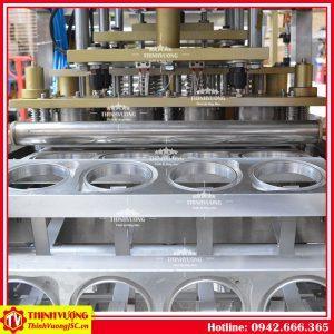 Máy chiết rót dạng lỏng dập nắp hộp tự động (4 hộp) – Hình ảnh máy tự động | ThinhVuongJSC.VN may chiet rot dang long dap nap hop tu dong 4 hop 10