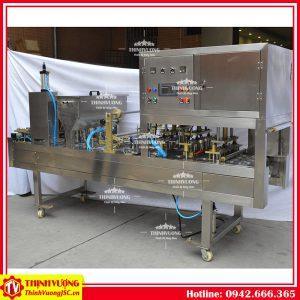 Máy chiết rót dạng lỏng dập nắp hộp tự động (4 hộp) – Hình ảnh máy tự động | ThinhVuongJSC.VN may chiet rot dang long dap nap hop tu dong 4 hop 2