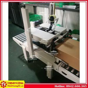 may dan ban dinh thung carton fxa 6050s 9