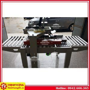 Máy dán băng dính thùng carton FXC-5050X – Hình ảnh máy tự động | ThinhVuongJSC.VN may dan bang dinh thung carton fxc5050x 2