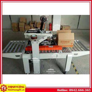 Máy dán băng dính thùng carton FXC-5050X – Hình ảnh máy tự động | ThinhVuongJSC.VN may dan bang dinh thung carton fxc5050x 3