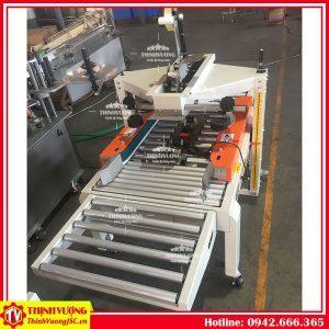 Máy dán băng dính thùng carton FXC-5050X – Hình ảnh máy tự động | ThinhVuongJSC.VN may dan bang dinh thung carton fxc5050x 6