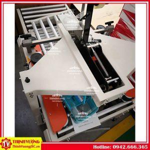 Máy dán băng dính thùng carton FXC-5050X – Hình ảnh máy tự động | ThinhVuongJSC.VN may dan bang dinh thung carton fxc5050x 8