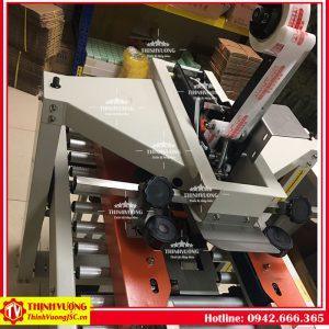 Máy dán băng dính thùng carton FXC-5050X – Hình ảnh máy tự động | ThinhVuongJSC.VN may dan bang dinh thung carton fxc5050x 9