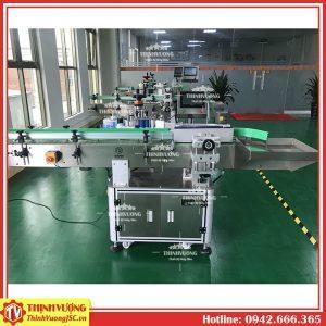 may dan nhan chai tron tu dong hz851