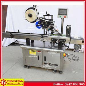 may dan nhan tu dong tren be mat phang 2