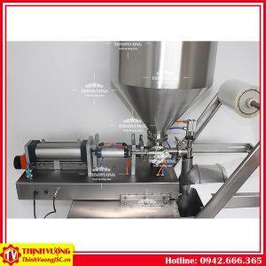 may dong goi nuoc sot dyt950 2